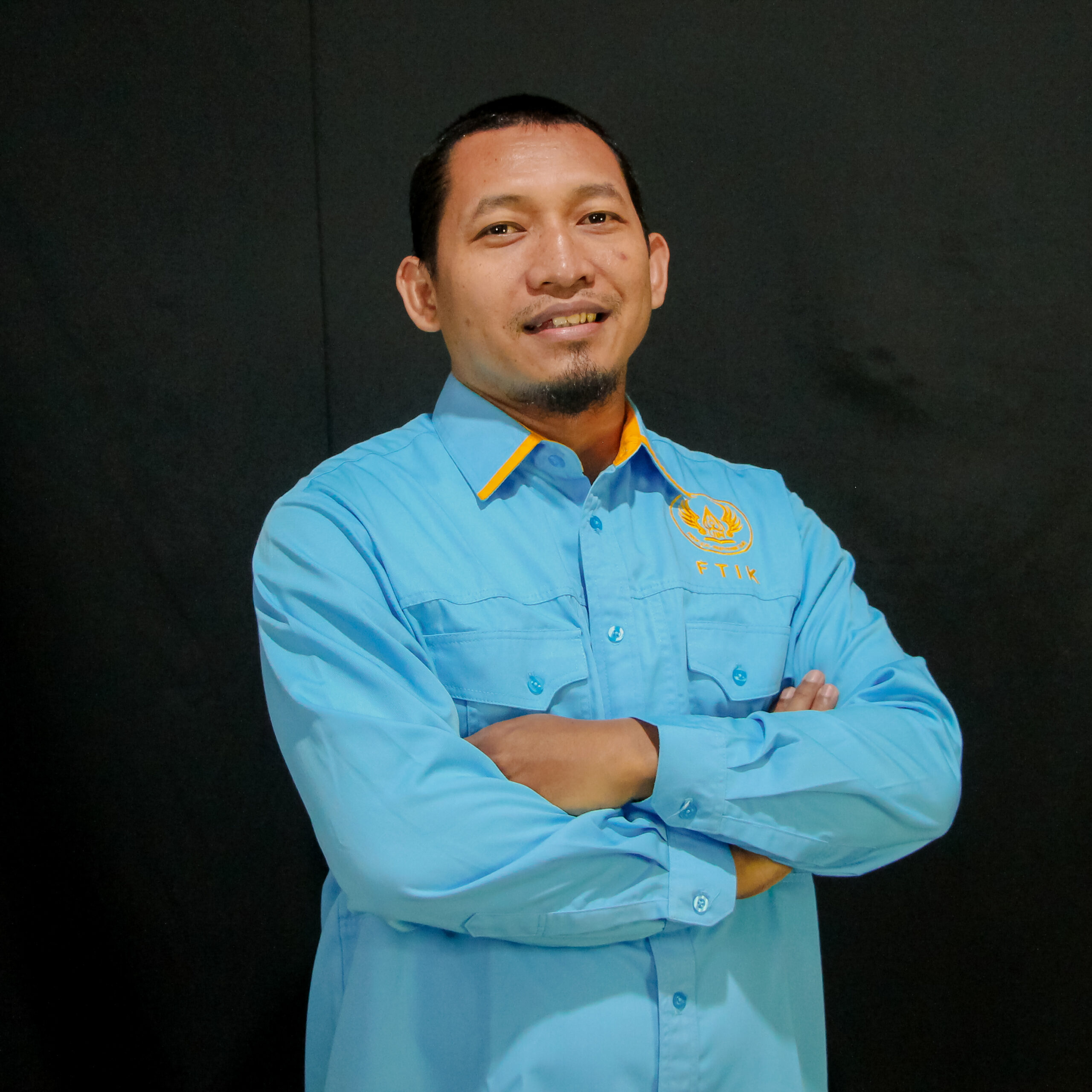 Tohir Zuhdi, S.Kom.